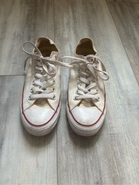 Converse low-top sneakers in cream with red trim